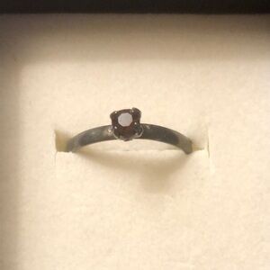 Elegant Silver Ring with Purple Gemstone